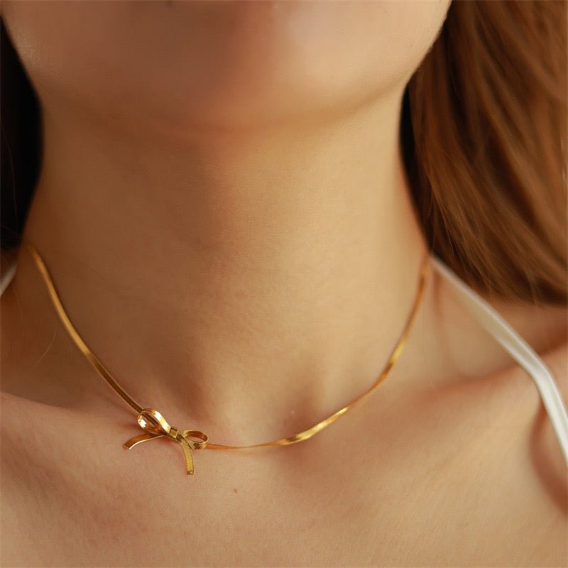Elegant Bow Knot Necklace With 18K Gold Plated Finish - TIRAAYA