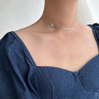 Elegant Bow Knot Necklace With 18K Gold Plated Finish - TIRAAYA