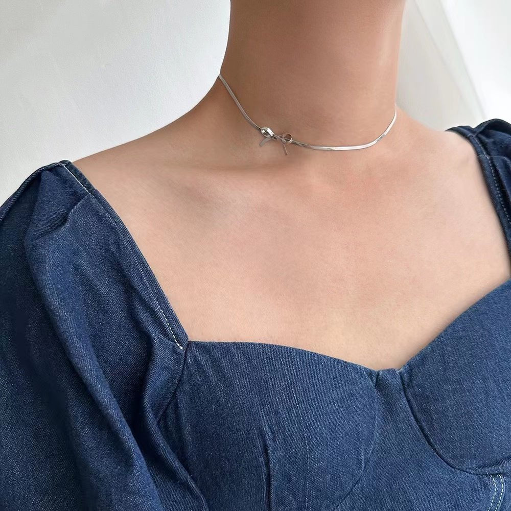 Elegant Bow Knot Necklace With 18K Gold Plated Finish - TIRAAYA