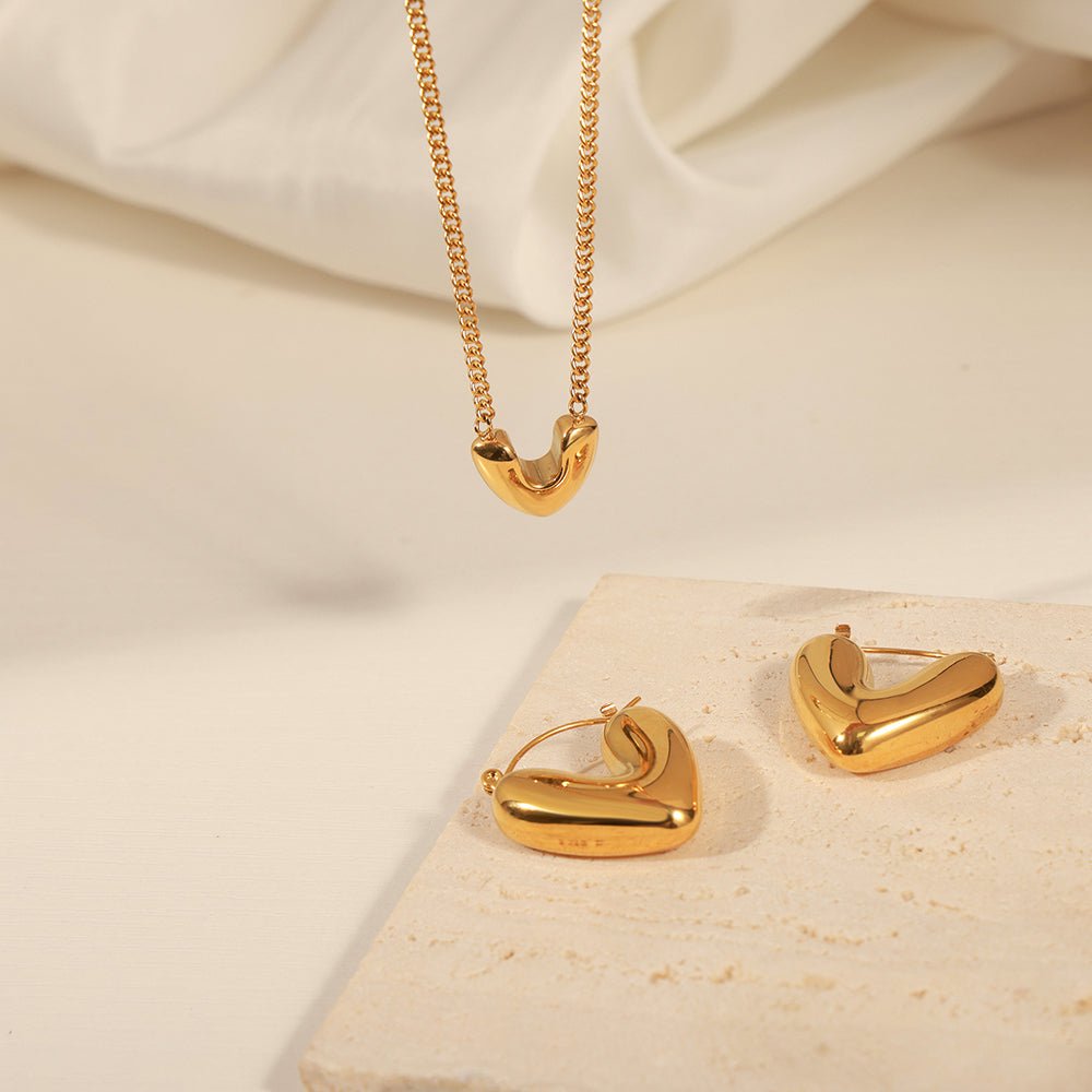 Elegant Heart Shape Earrings And Necklace With Gold Plated Finish - TIRAAYA