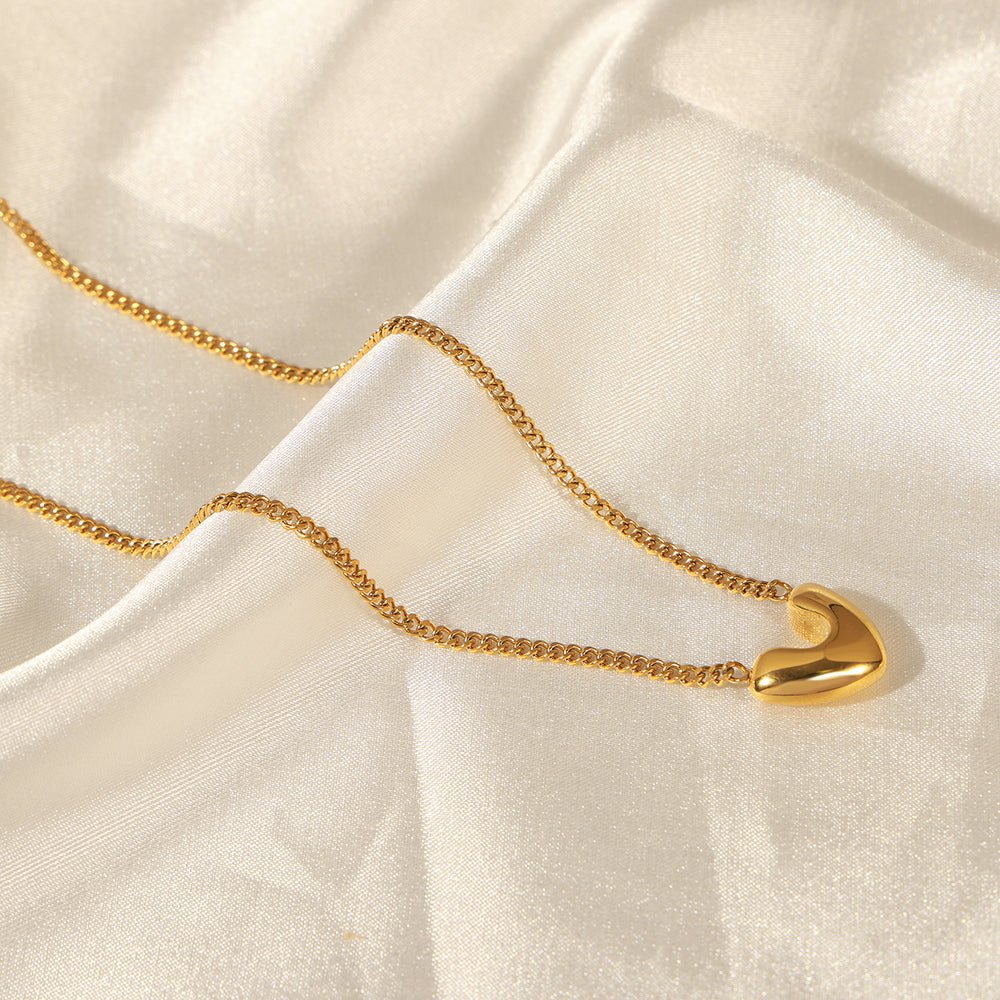Elegant Heart Shape Earrings And Necklace With Gold Plated Finish - TIRAAYA