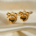 Elegant Heart Shape Bow Knot Drop Earrings With Gold Plated Finish - TIRAAYA