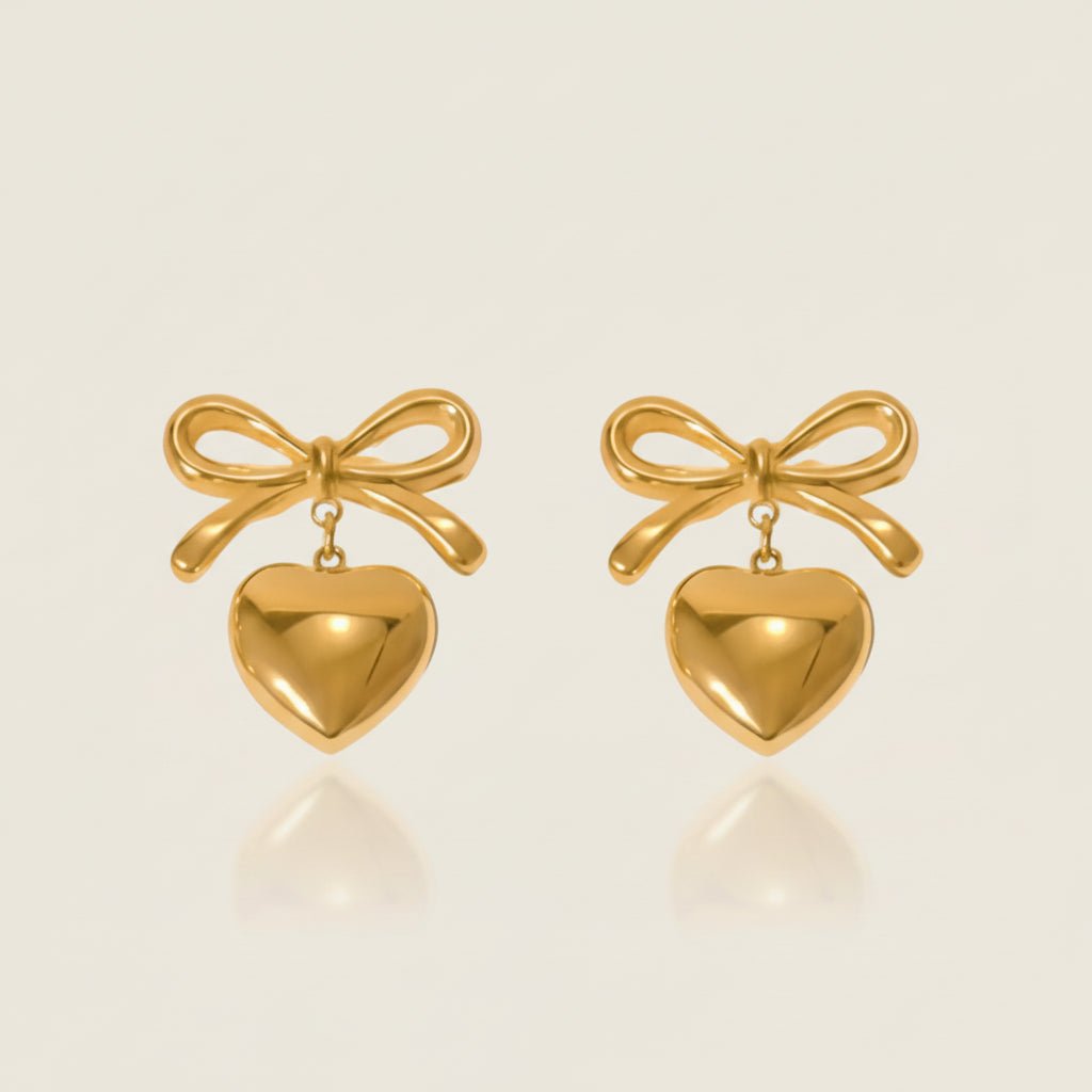 Elegant Heart Shape Bow Knot Drop Earrings With Gold Plated Finish - TIRAAYA