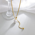 Elegant Asymmetrical Gold Plated Stainless Steel Pendant Necklace - TIRAAYA