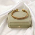 Elegant Braided Gold Plated Stainless Steel Waterproof Bangle - TIRAAYA
