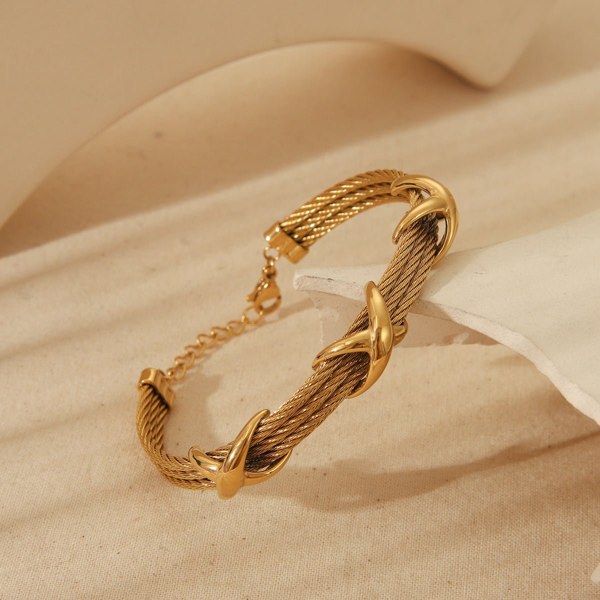 Retro Spiral Bangle In Stainless Steel With 18K Gold Plated Finish - TIRAAYA