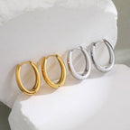 Elegant U Shape Earrings With Real Gold Plated Finish - TIRAAYA