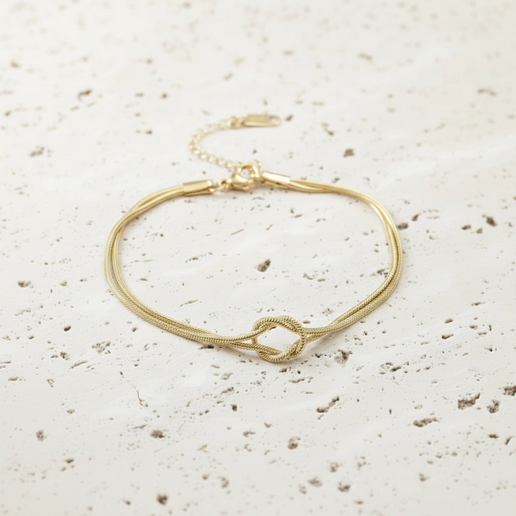 Sweet Knot Snake Chain Bracelet In Stainless Steel With Gold And Silver Finish - TIRAAYA
