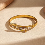 Modern Wave Stripe Bangle In Stainless Steel With Gold Plated Finish - TIRAAYA