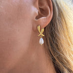 Elegant Pearl Chili Stud Earrings With Gold Plated Finish - TIRAAYA