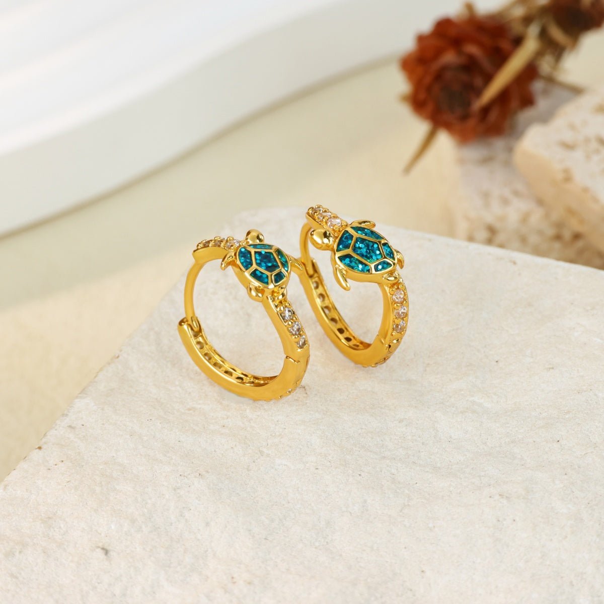 Elegant Three Dimensional Stud Earrings With Zircon Gold Plated Finish - TIRAAYA