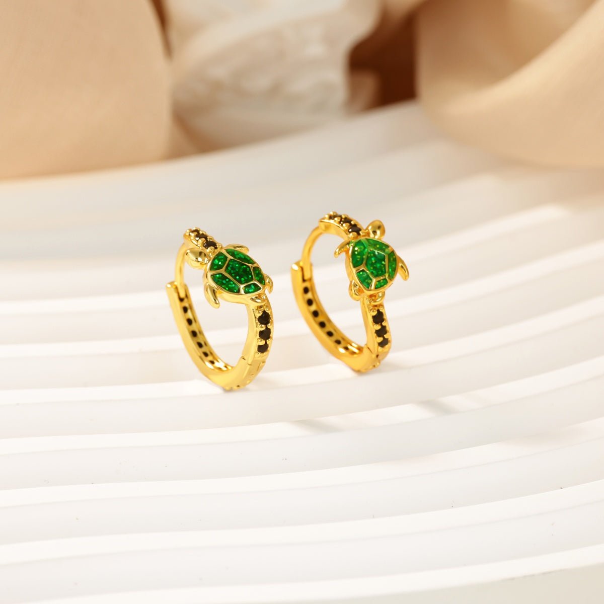 Elegant Three Dimensional Stud Earrings With Zircon Gold Plated Finish - TIRAAYA