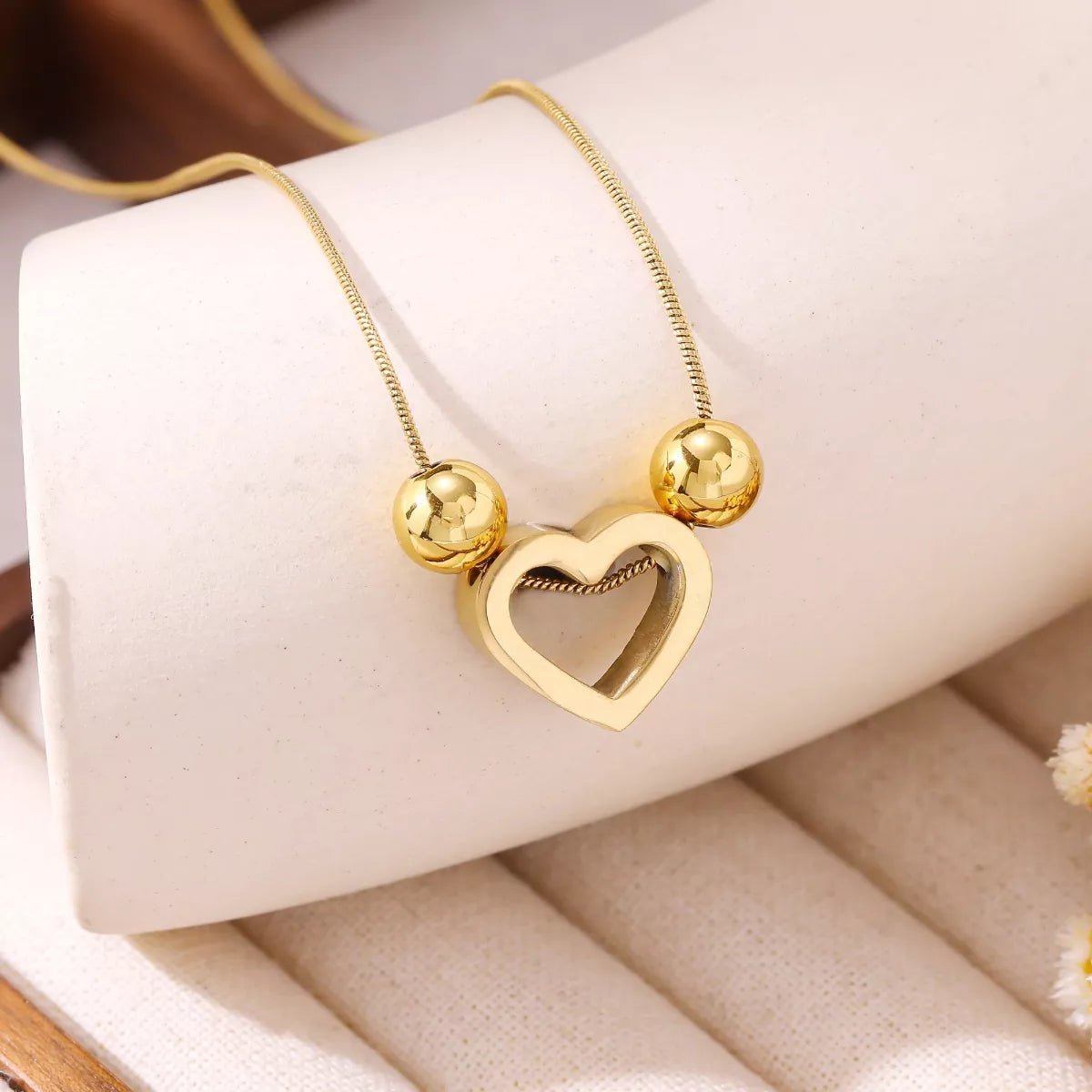 Elegant Heart Shape Pendant Necklace With Gold Plated Finish - TIRAAYA