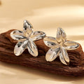 Elegant Floral Embossed Stainless Steel Earrings For Women - TIRAAYA