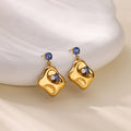 Geometric Drop Earrings In Stainless Steel With Gold Plated Finish - TIRAAYA