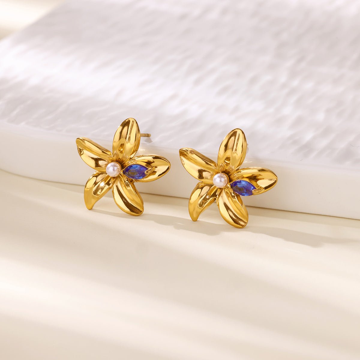 Elegant 3D Flower Stud Earrings With Gold Plated Finish - TIRAAYA