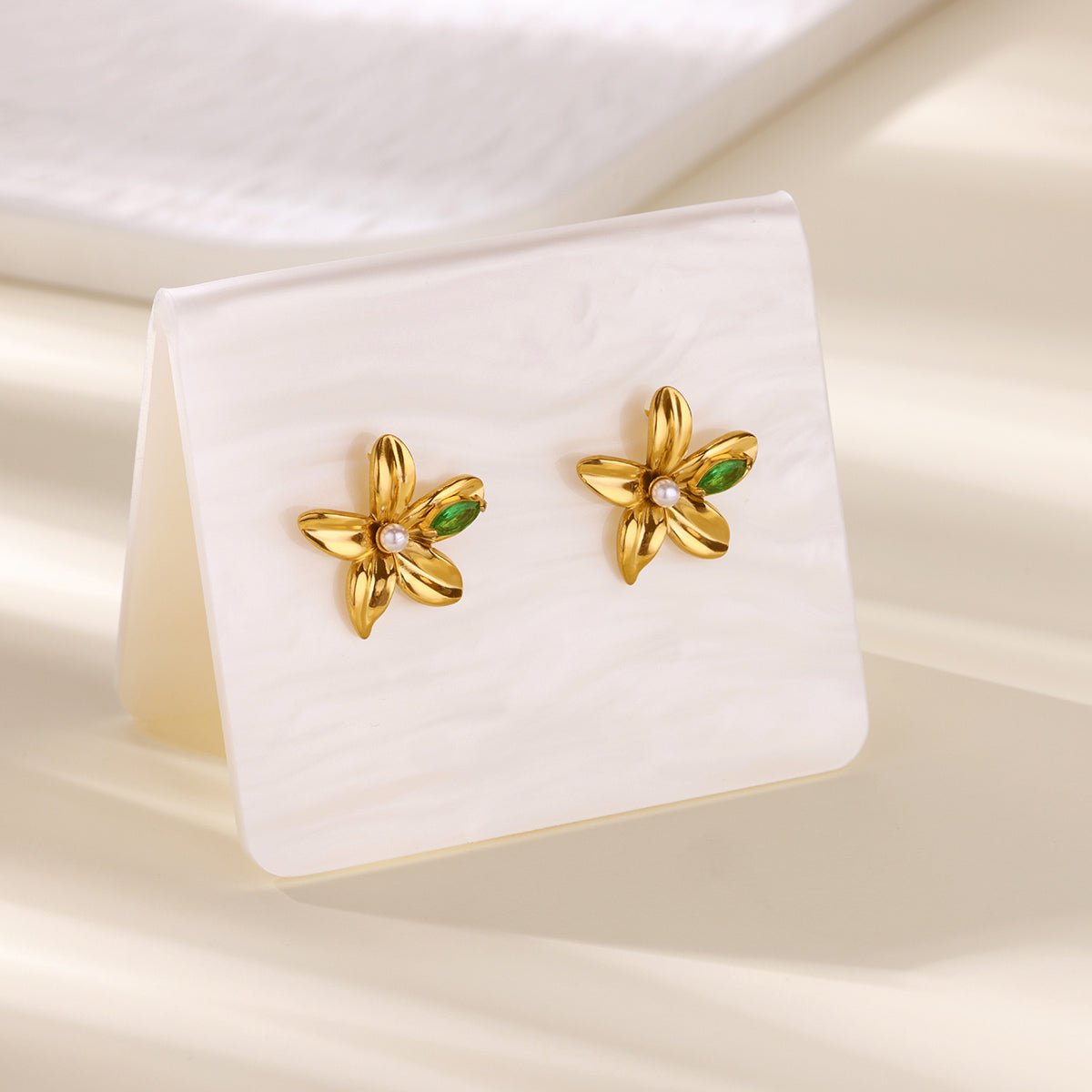 Elegant 3D Flower Stud Earrings With Gold Plated Finish - TIRAAYA