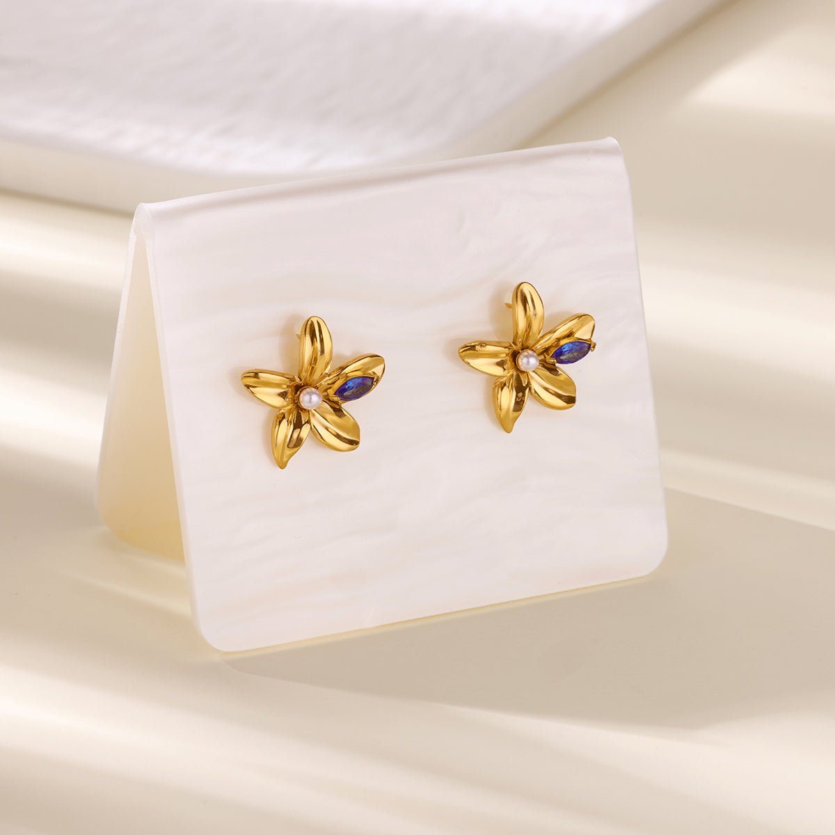 Elegant 3D Flower Stud Earrings With Gold Plated Finish - TIRAAYA