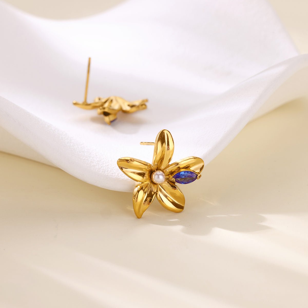 Elegant 3D Flower Stud Earrings With Gold Plated Finish - TIRAAYA