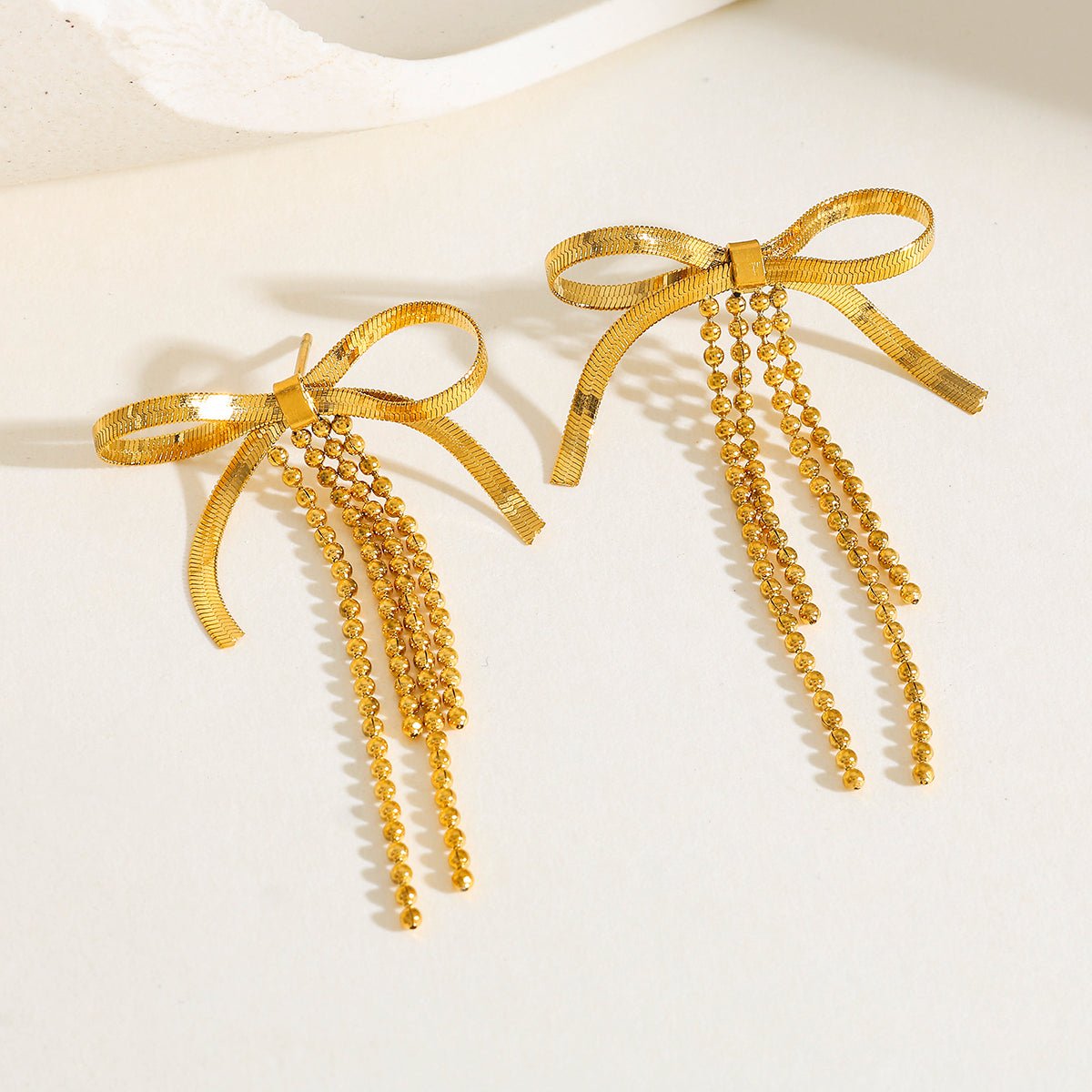 Elegant Bow Knot Earrings With 18K Gold Plated Finish - TIRAAYA