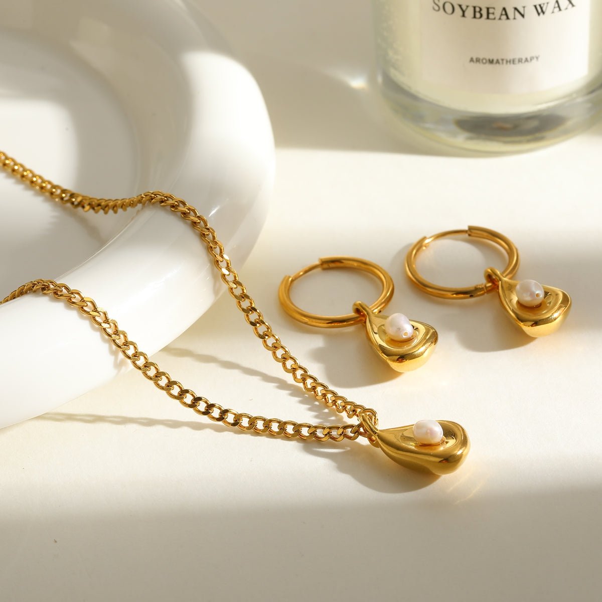Elegant Leaf Pearl Jewelry Set With Gold Plated Finish - TIRAAYA