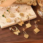 Elegant Flower Drop Earrings With Zircon And Gold Plated Finish - TIRAAYA