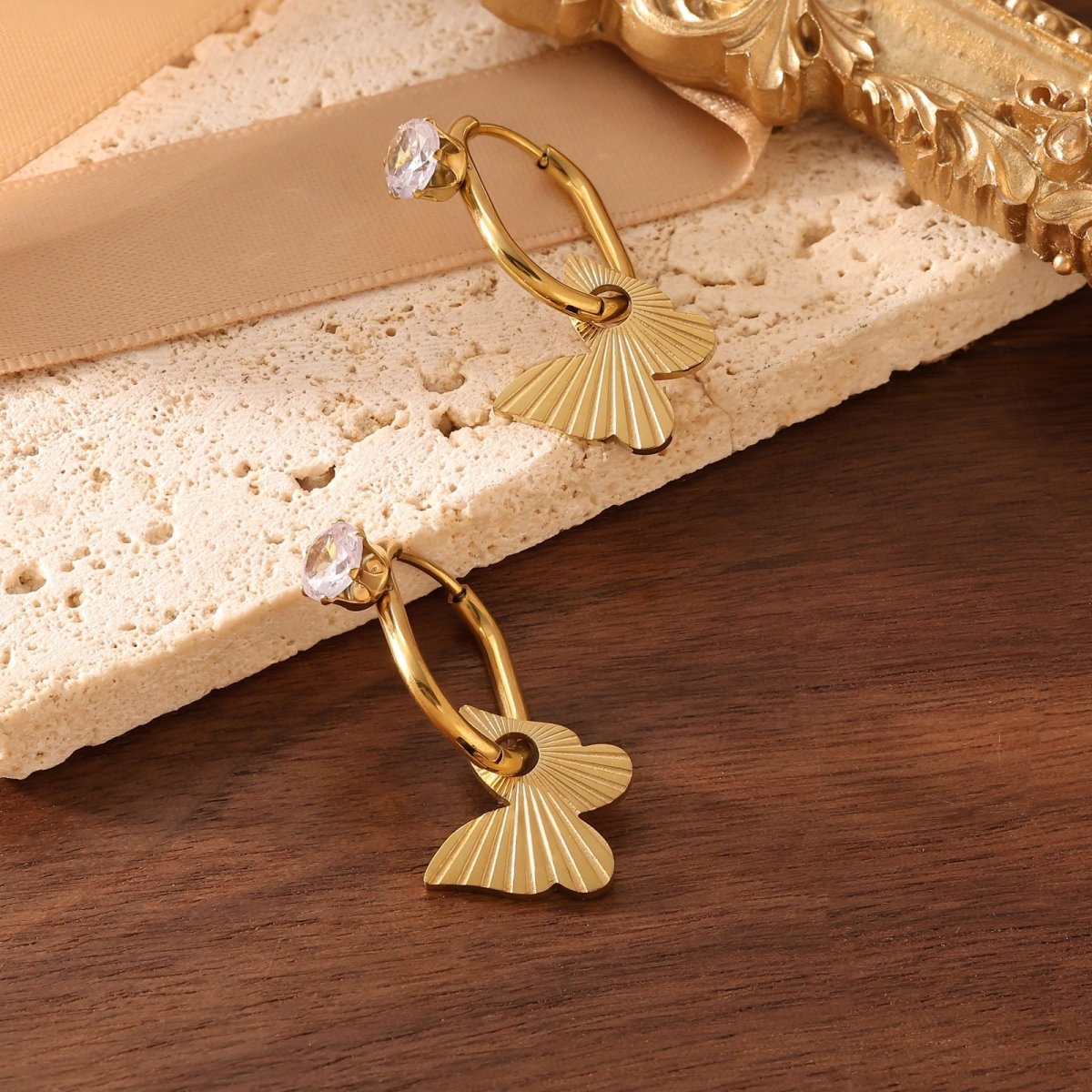 Elegant Flower Drop Earrings With Zircon And Gold Plated Finish - TIRAAYA