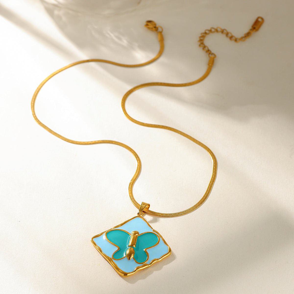 Elegant Butterfly Shell Eye Pendant Necklace With Gold Plated Finish - TIRAAYA