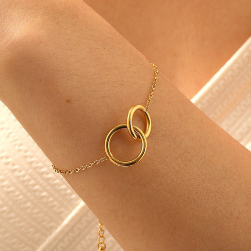 Double Ring Bracelet With Interlocking Gold Plated Design - TIRAAYA