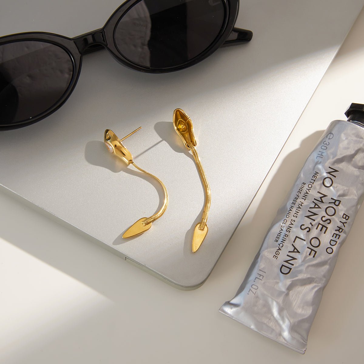 Elegant Snake Tassel Earrings With Zircon And Gold Plated Finish - TIRAAYA