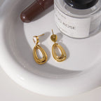 Elegant Asymmetric Water Drop Zircon Gold Plated Stainless Steel Earrings - TIRAAYA