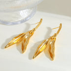 Elegant Wings In Gold Plated Stainless Steel Stud Earrings - TIRAAYA