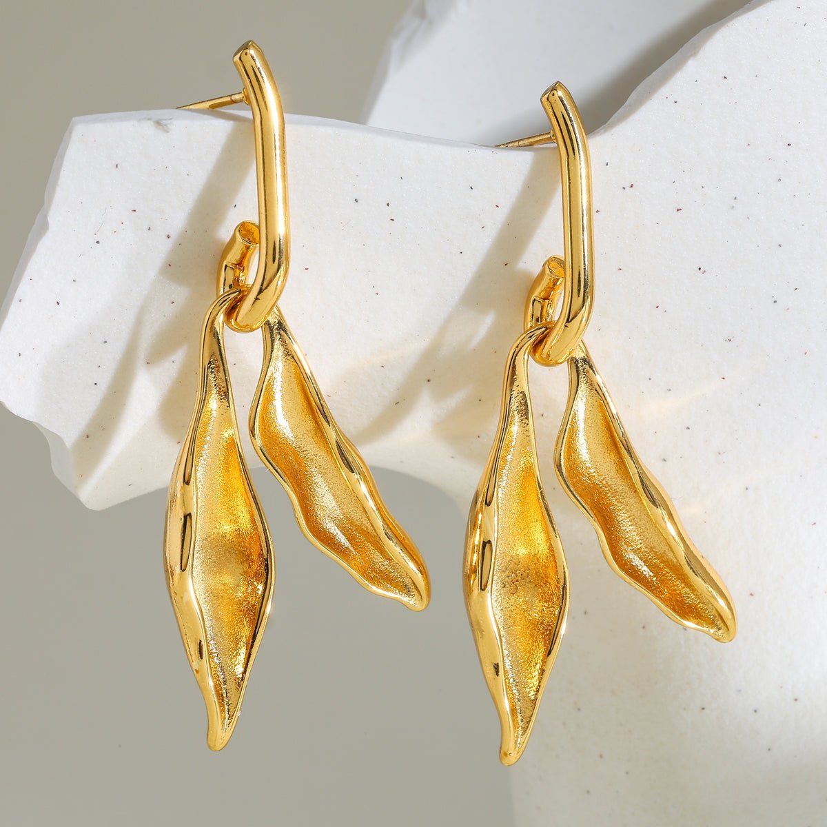Elegant Wings In Gold Plated Stainless Steel Stud Earrings - TIRAAYA