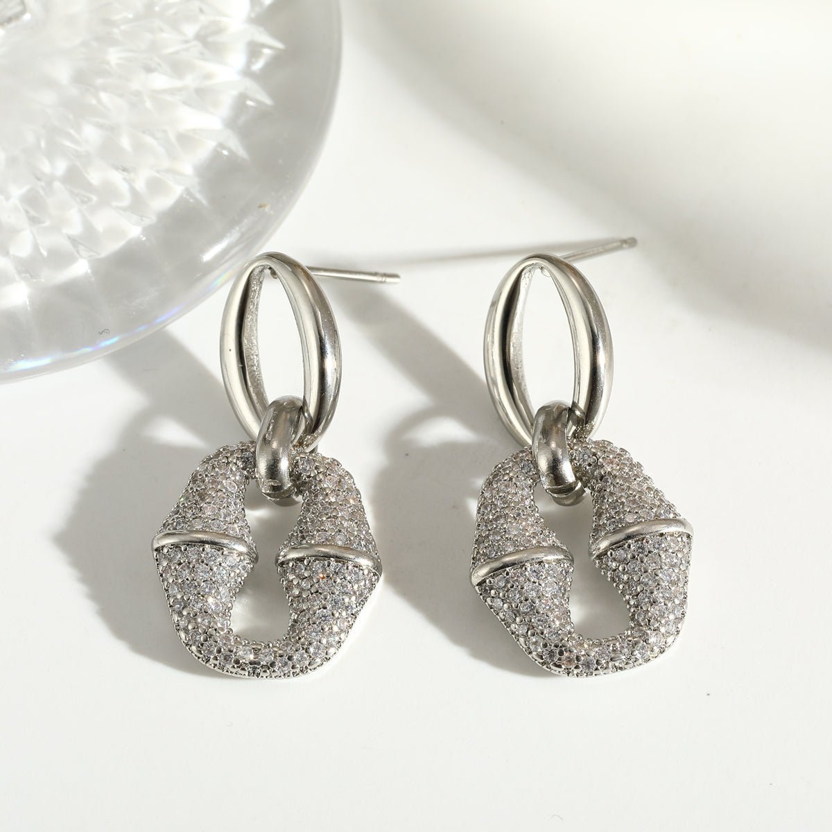 Infinity Oval Stud Earrings With Zircon Gold Plated Finish - TIRAAYA