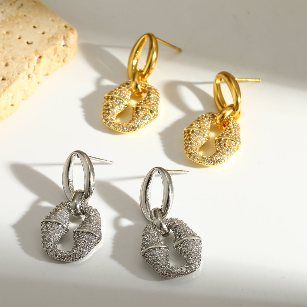 Infinity Oval Stud Earrings With Zircon Gold Plated Finish - TIRAAYA