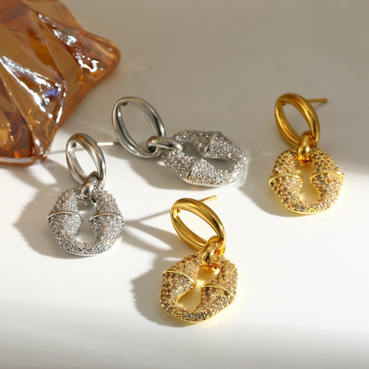 Infinity Oval Stud Earrings With Zircon Gold Plated Finish - TIRAAYA