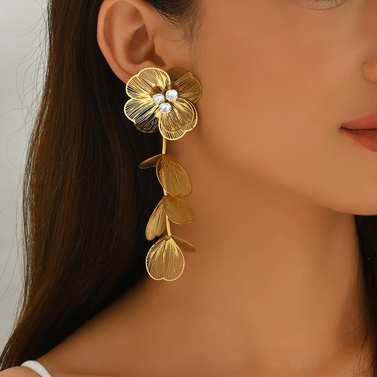 Elegant Flower Earrings With Zircon And Gold Plated Finish - TIRAAYA