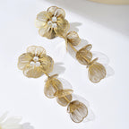 Elegant Flower Earrings With Zircon And Gold Plated Finish - TIRAAYA