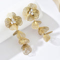 Elegant Flower Earrings With Zircon And Gold Plated Finish - TIRAAYA