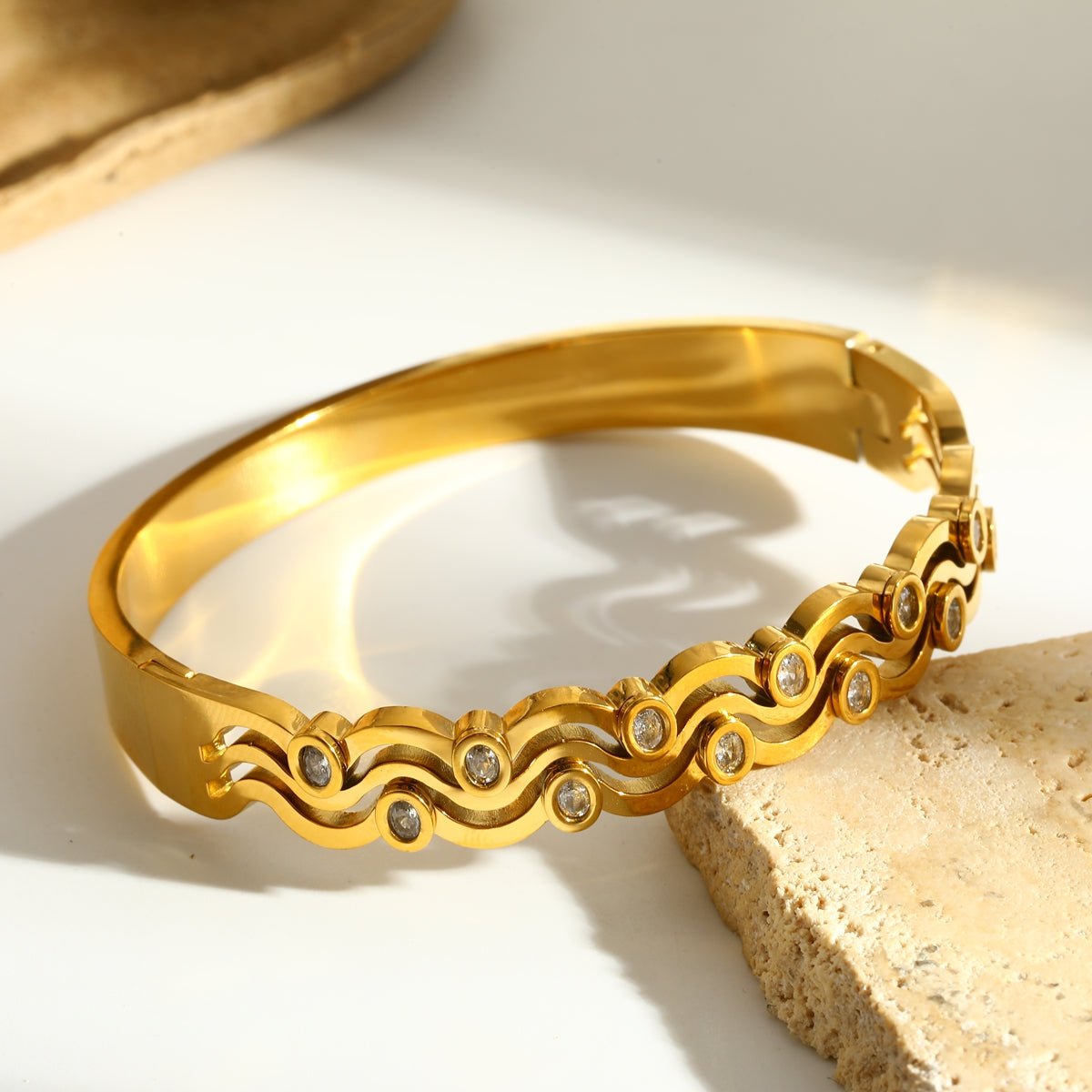 Elegant Waves Zircon Gold Plated Stainless Steel Bangle - TIRAAYA