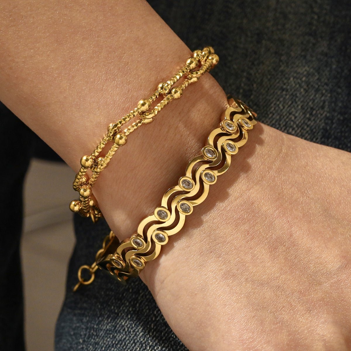 Elegant Waves Zircon Gold Plated Stainless Steel Bangle - TIRAAYA