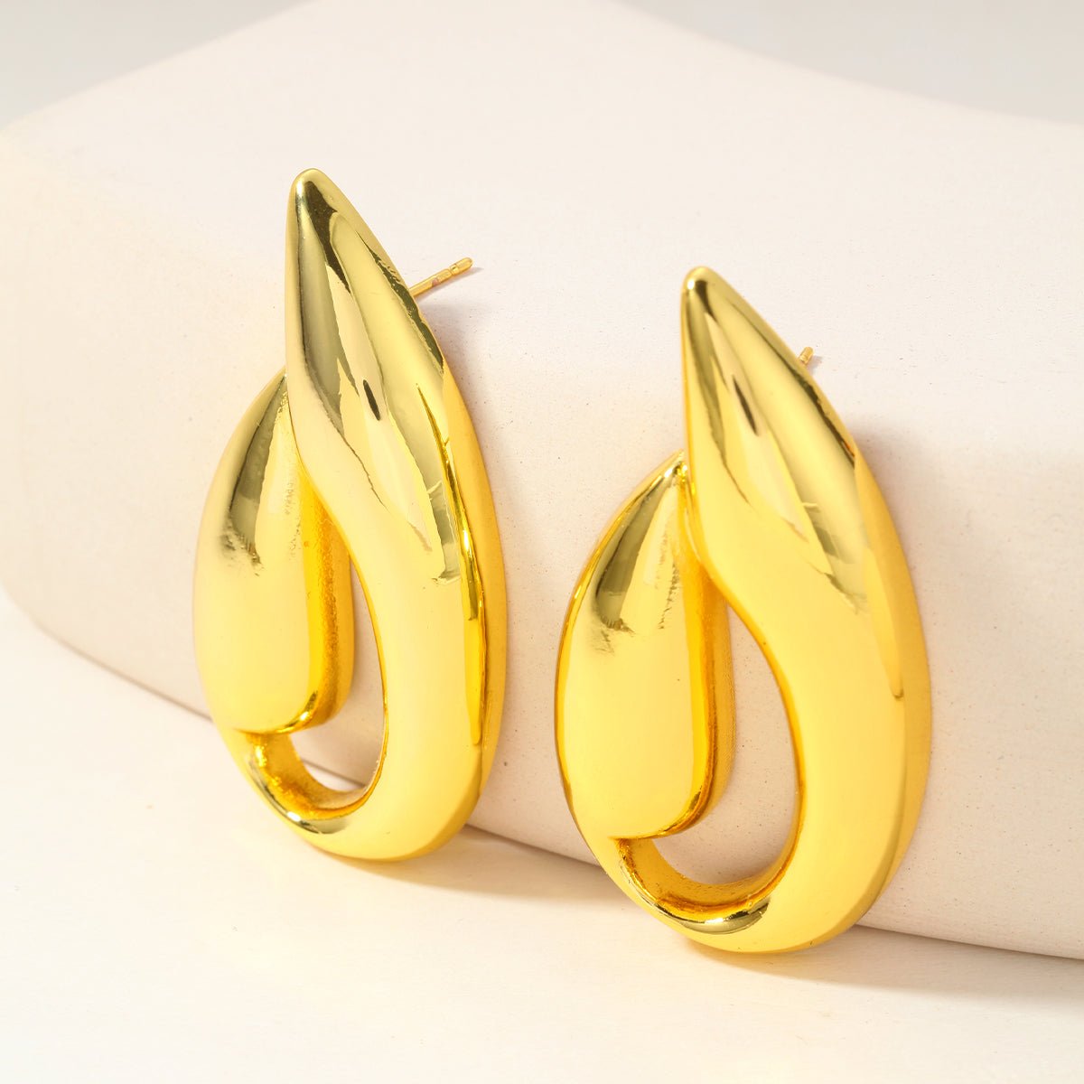 Elegant Geometric Stud Earrings In Stainless Steel With Gold Plated Finish - TIRAAYA