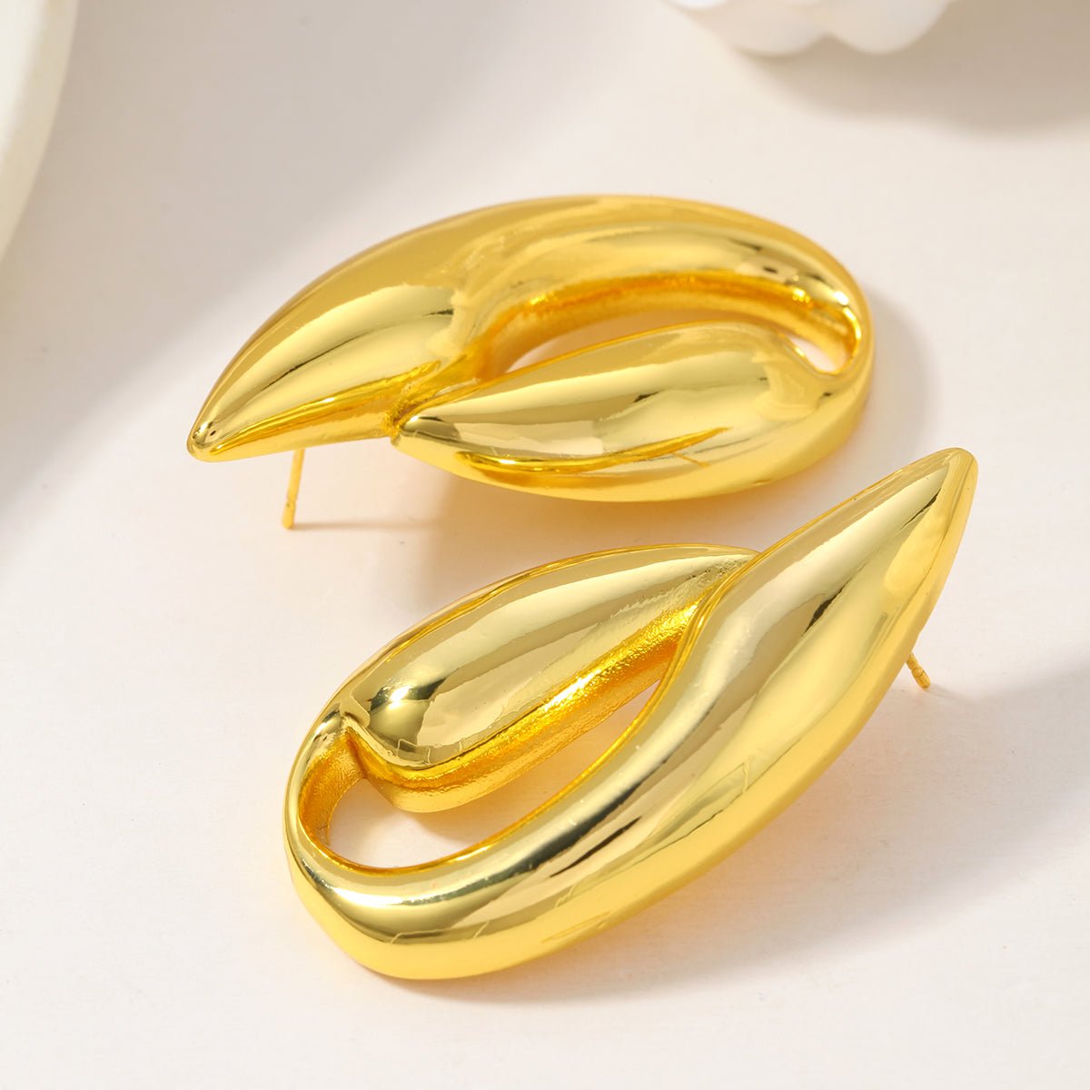 Elegant Geometric Stud Earrings In Stainless Steel With Gold Plated Finish - TIRAAYA