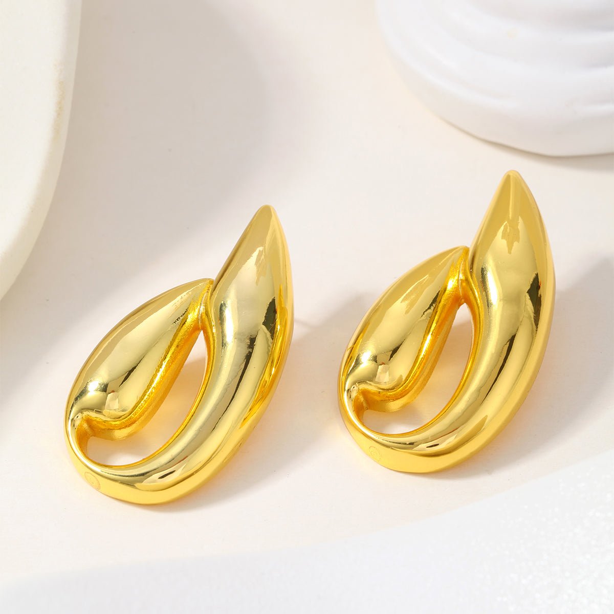 Elegant Geometric Stud Earrings In Stainless Steel With Gold Plated Finish - TIRAAYA