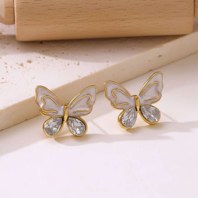 Elegant Butterfly Stud Earrings With Enamel And Gold Plated Finish - TIRAAYA