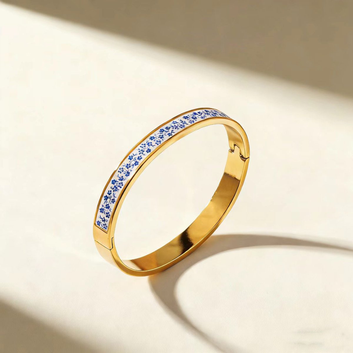 Elegant Geometric Gold Plated Stainless Steel Bangle For Women - TIRAAYA