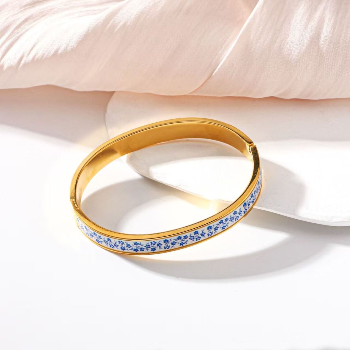 Elegant Geometric Gold Plated Stainless Steel Bangle For Women - TIRAAYA