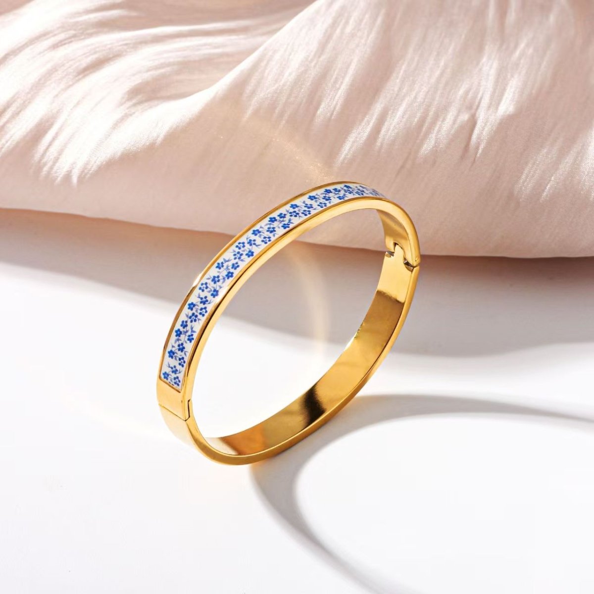 Elegant Geometric Gold Plated Stainless Steel Bangle For Women - TIRAAYA