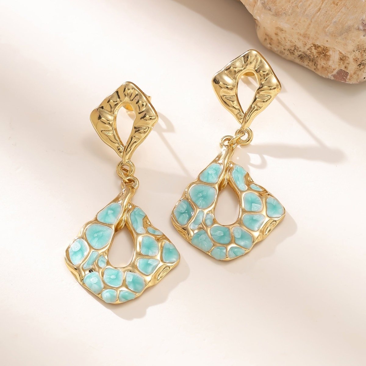 Elegant Geometric Stud Earrings in Stainless Steel With Gold Plated Finish - TIRAAYA