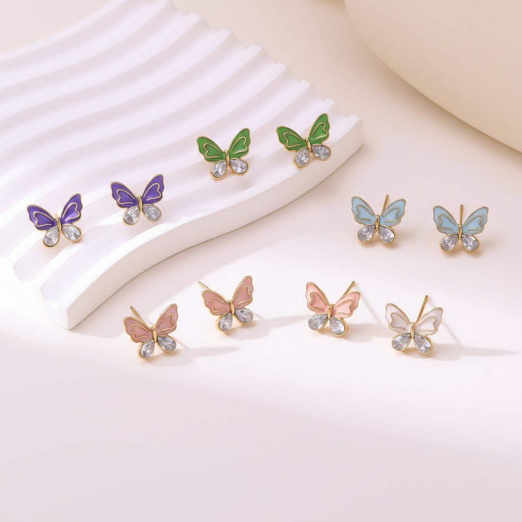 Elegant Butterfly Stud Earrings With Enamel And Gold Plated Finish - TIRAAYA